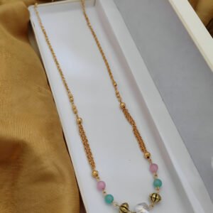 Stunning golden moti mala with pink, blue, and green moti