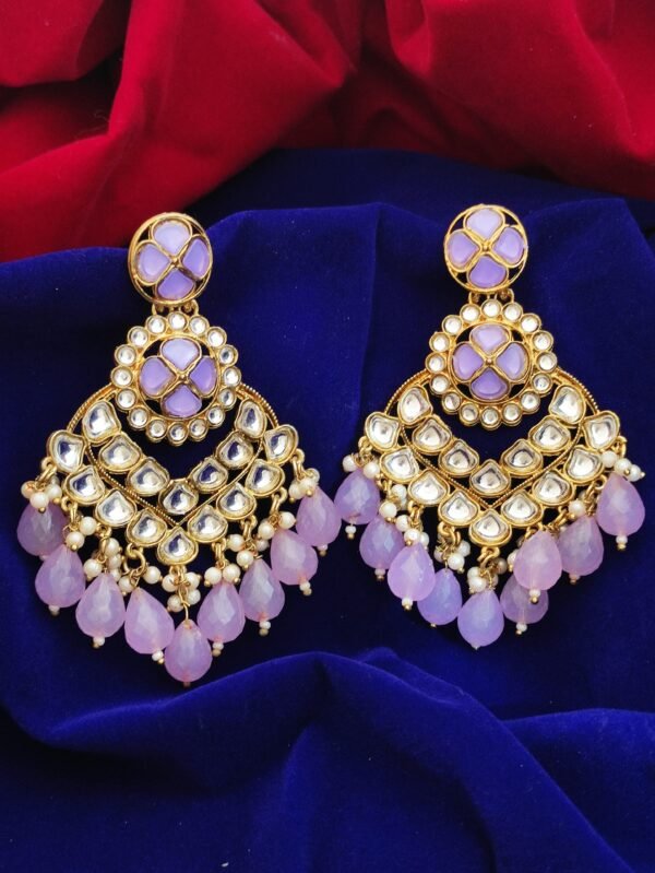 Purple pearl earrings with intricate design