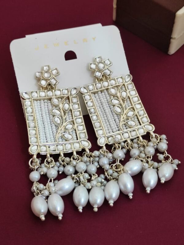 White beads earrings with intricate design