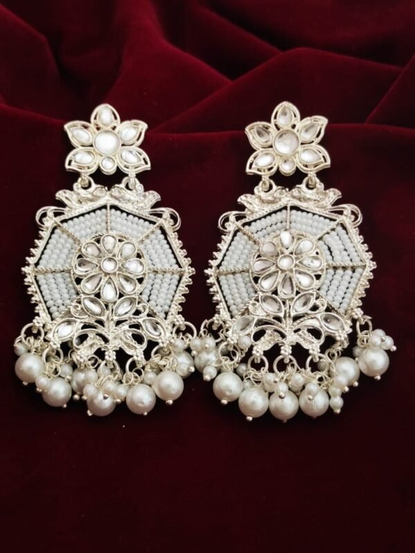 Elegant fancy earrings with white pearl design