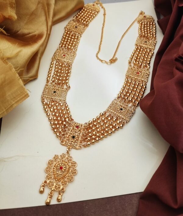 Golden ball mala with intricate craftsmanship